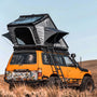 TOPOAK Stellar rooftop tent shown from a rear angle, fully opened on a vehicle for overland camping